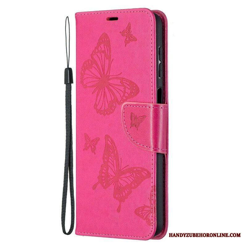 Flip Case Samsung Galaxy M12 / A12 Perhosia Lennossa Lanyardin Kanssa